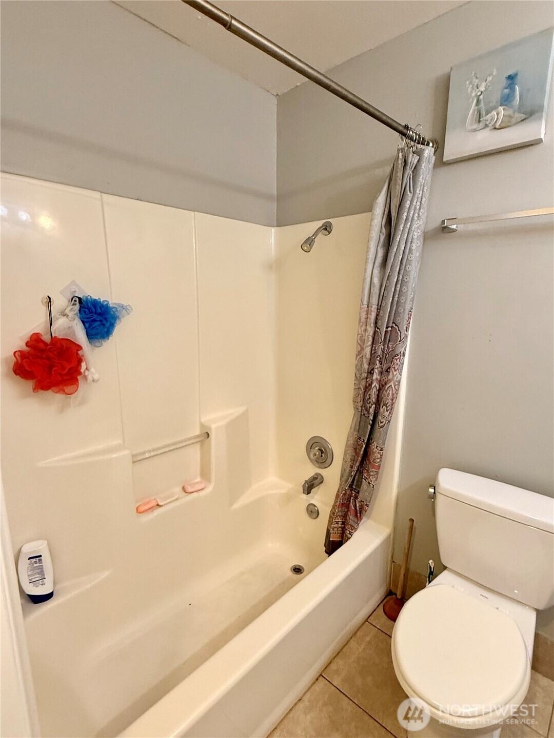 812 Ferry Street Wenatchee, WA 98801 - Photo 19 of 29 a white toilet sitting next to a bath tub