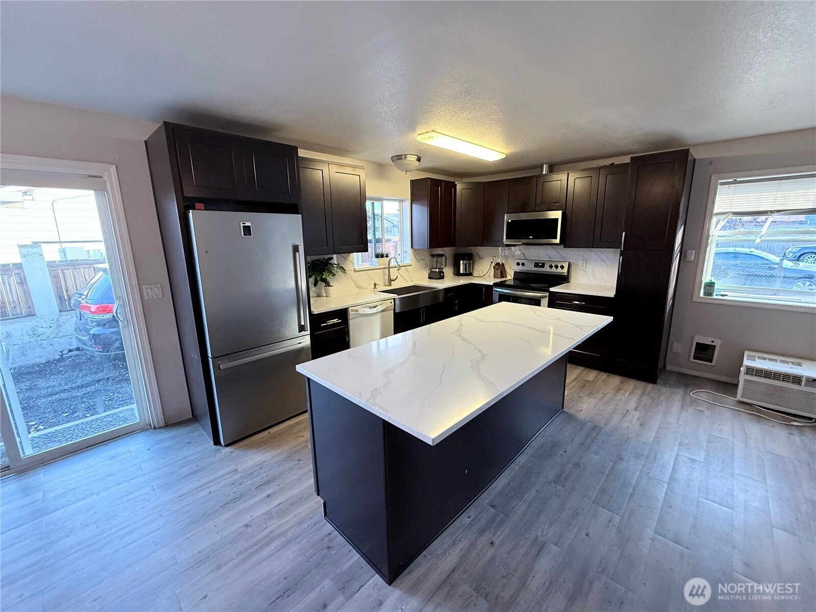 812 Ferry Street Wenatchee, WA 98801 - Photo 26 of 29 a kitchen with a refrigerator a sink dishwasher stove and refrigerator