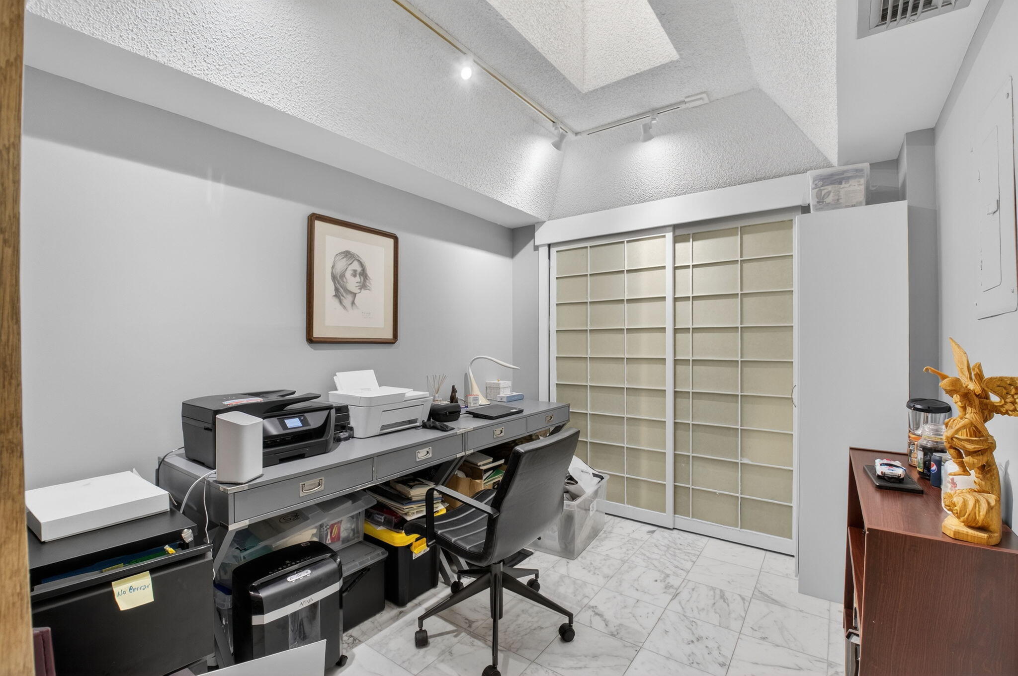 7369 Orangewood Lane, Unit 307 Boca Raton, FL 33433 - Photo 18 of 37 a reading room with furniture and wooden floor