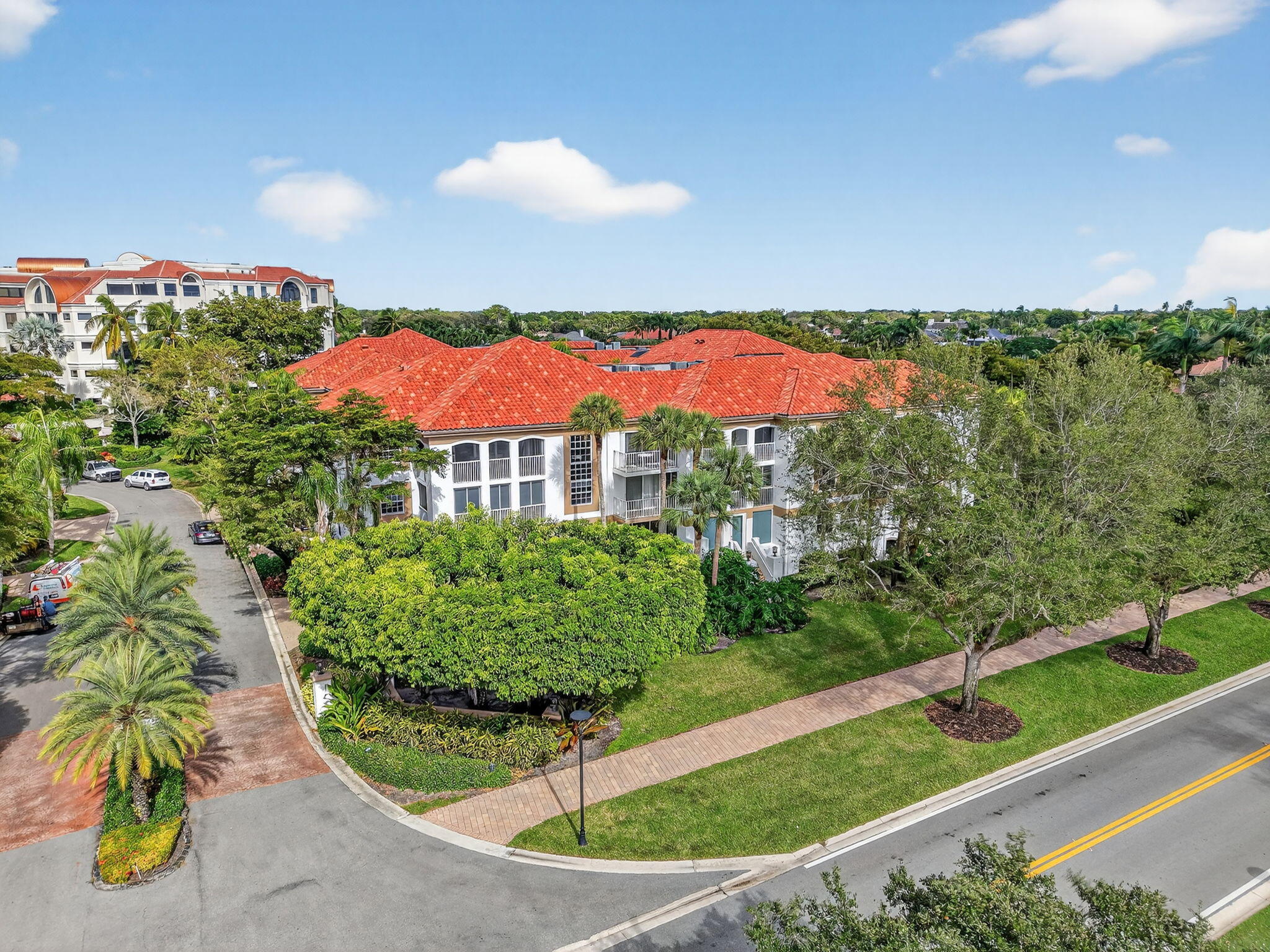 7369 Orangewood Lane, Unit 307 Boca Raton, FL 33433 - Photo 28 of 37 an aerial view of a house