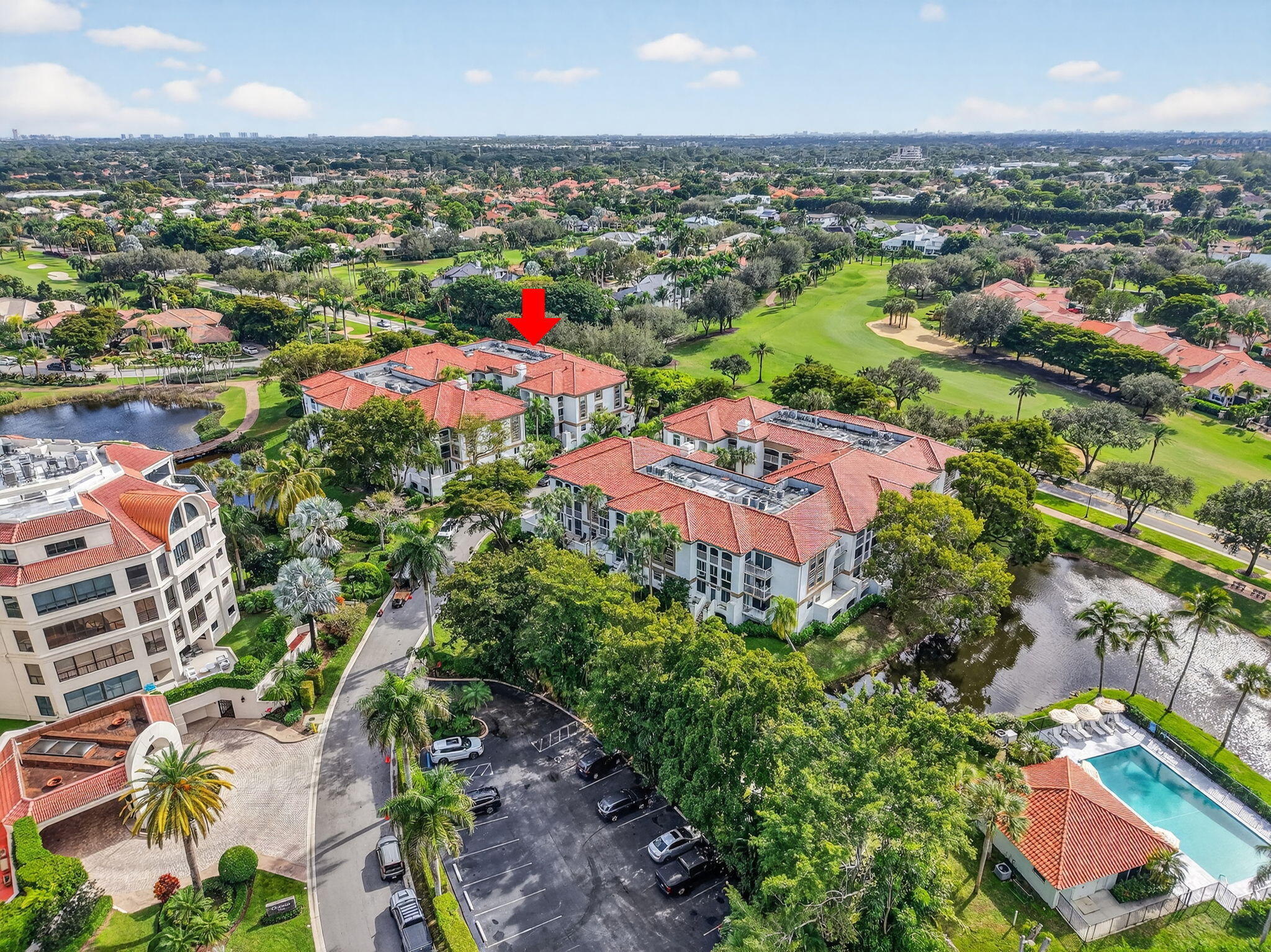 7369 Orangewood Lane, Unit 307 Boca Raton, FL 33433 - Photo 34 of 37 an aerial view of residential houses with outdoor space and swimming pool