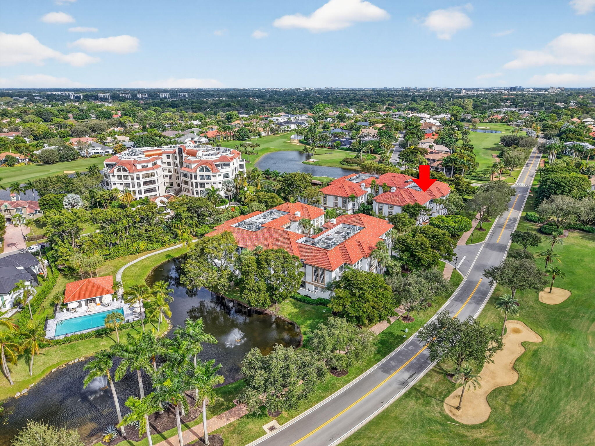 7369 Orangewood Lane, Unit 307 Boca Raton, FL 33433 - Photo 36 of 37 an aerial view of residential houses with outdoor space