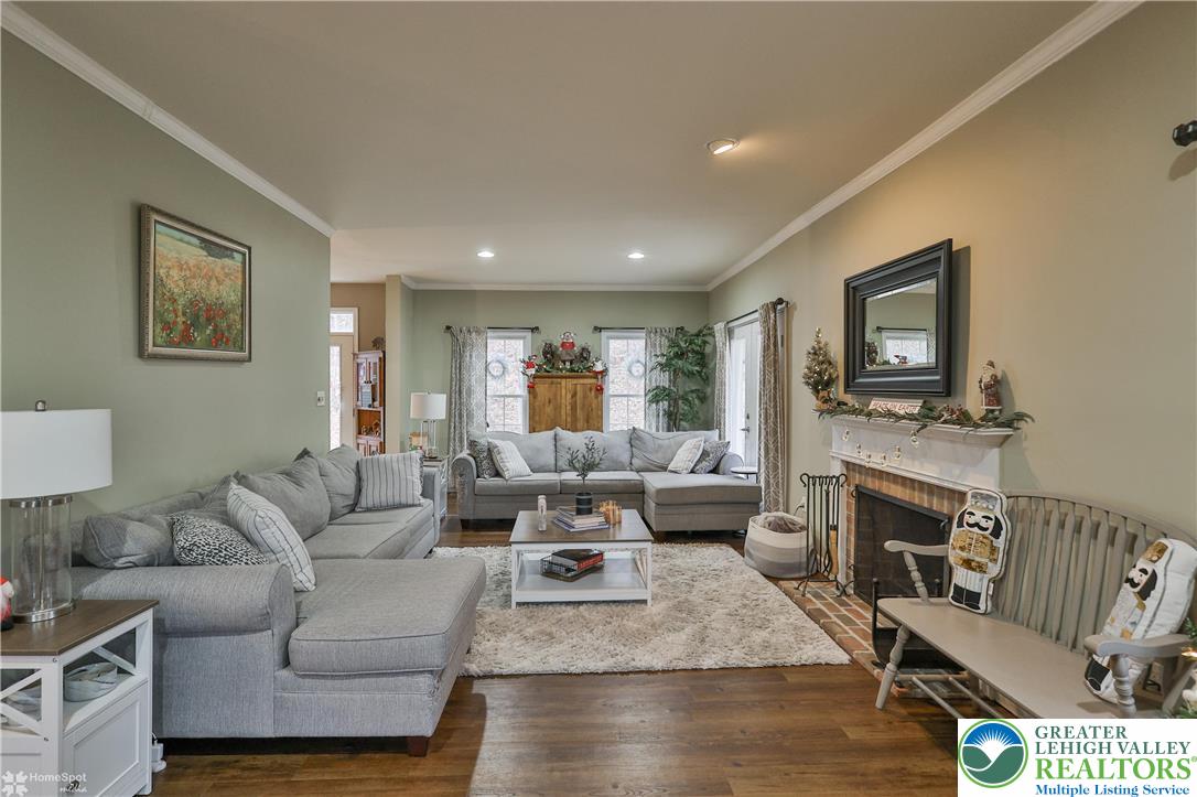 3475 Honeysuckle Road Bethlehem, PA 18015 - Photo 14 of 87 a living room with fireplace furniture and a fireplace