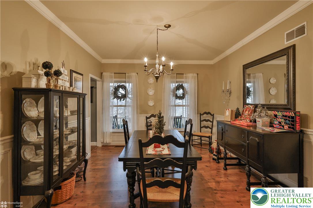 3475 Honeysuckle Road Bethlehem, PA 18015 - Photo 28 of 87 a view of a dining room with furniture and chandelier