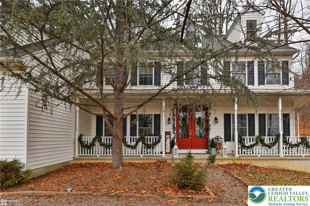 3475 Honeysuckle Road Bethlehem, PA 18015 - Photo 3 of 87 a view of a chairs and tables in the patio