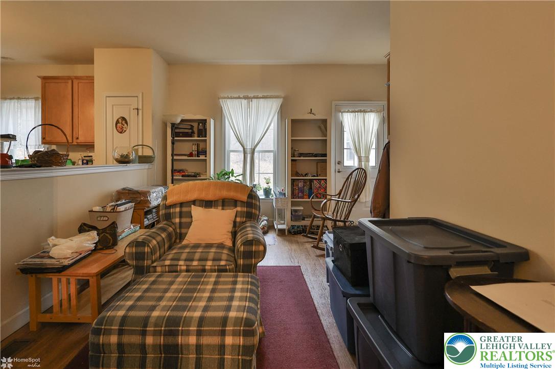 3475 Honeysuckle Road Bethlehem, PA 18015 - Photo 60 of 87 a bedroom with a bed and a dresser next to a window