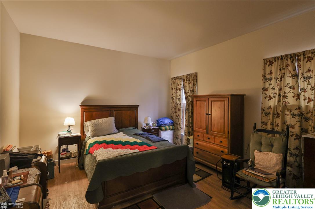 3475 Honeysuckle Road Bethlehem, PA 18015 - Photo 66 of 87 a bedroom with a bed and dresser