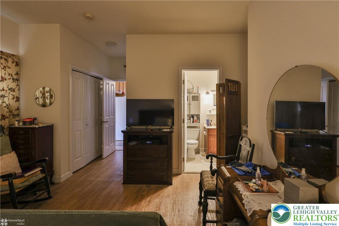3475 Honeysuckle Road Bethlehem, PA 18015 - Photo 67 of 87 a living room with furniture and a flat screen tv