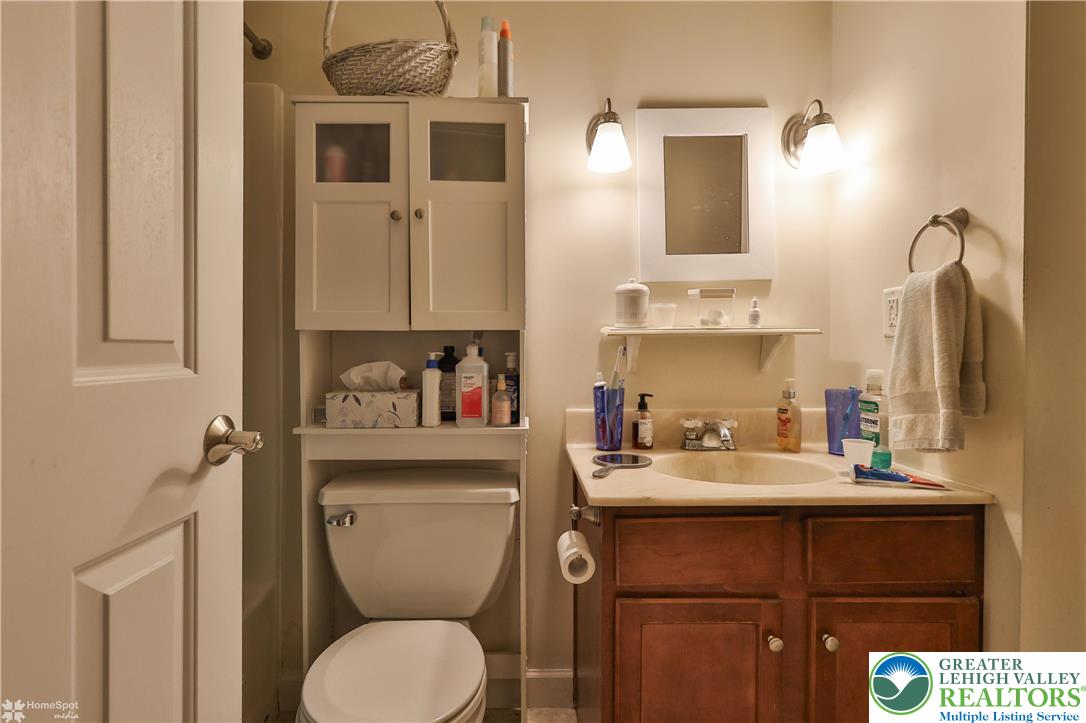 3475 Honeysuckle Road Bethlehem, PA 18015 - Photo 70 of 87 a bathroom with a toilet sink and mirror