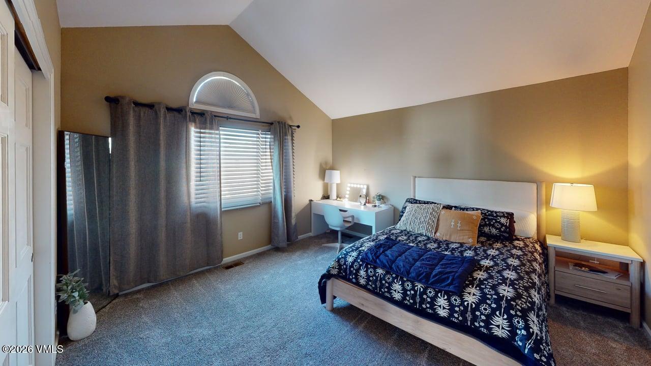 8958 South Forrest Drive Littleton, CO 80126 - Photo 11 of 27 a bed room with a bed and a night stand