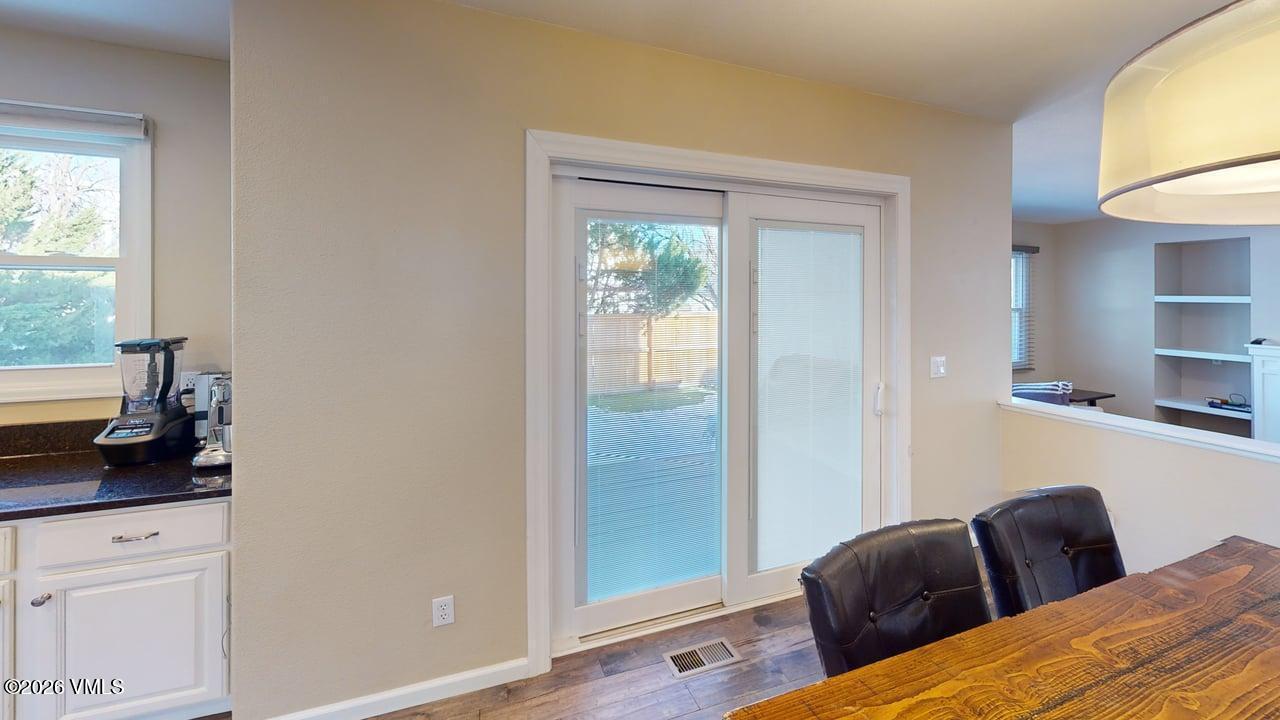 8958 South Forrest Drive Littleton, CO 80126 - Photo 15 of 27 a bedroom with a bed and a window