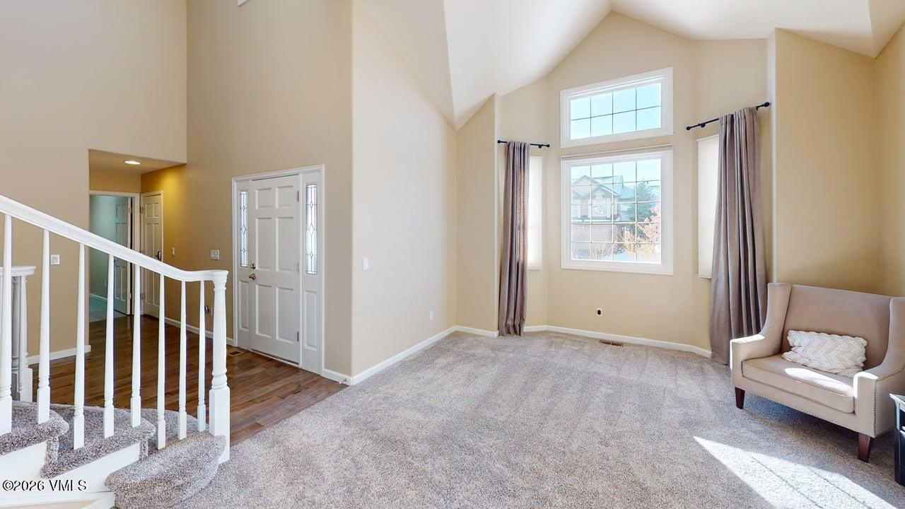 8958 South Forrest Drive Littleton, CO 80126 - Photo 23 of 27 a view of livingroom with furniture and windows