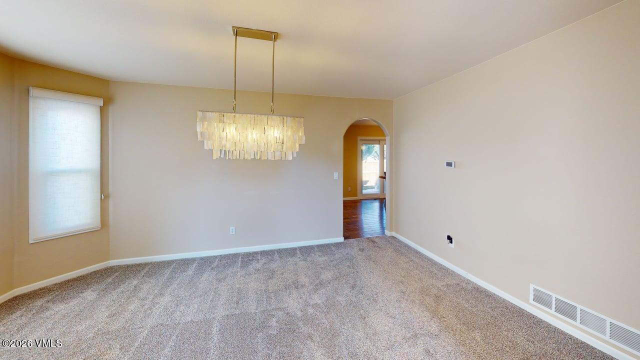 8958 South Forrest Drive Littleton, CO 80126 - Photo 24 of 27 a view of an empty room with a window