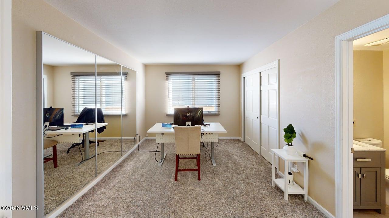 8958 South Forrest Drive Littleton, CO 80126 - Photo 26 of 27 a living room with furniture and a window