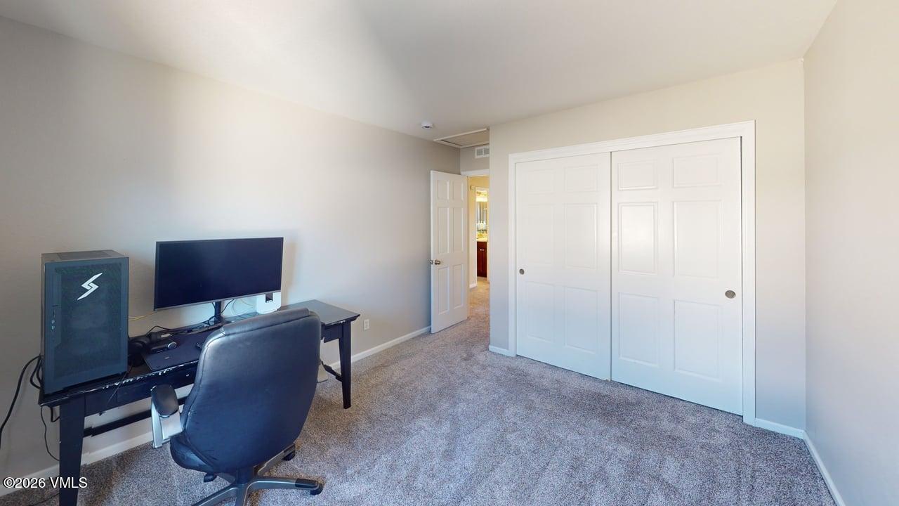 8958 South Forrest Drive Littleton, CO 80126 - Photo 6 of 27 a workspace with furniture and a window