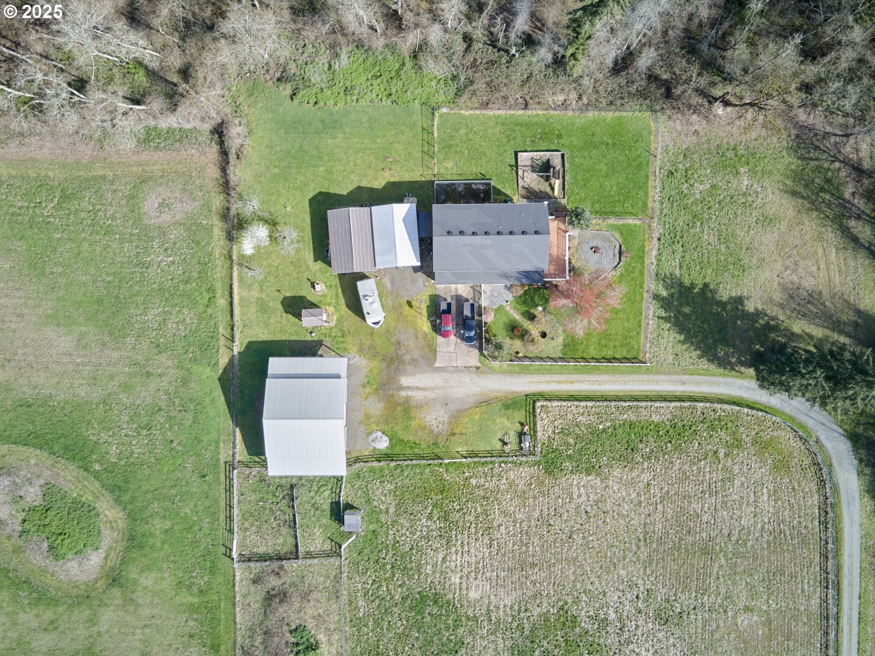 710 Northeast 221st Way Ridgefield, WA 98642 - Photo 17 of 23 an aerial view of a house with a yard basket ball court and outdoor seating