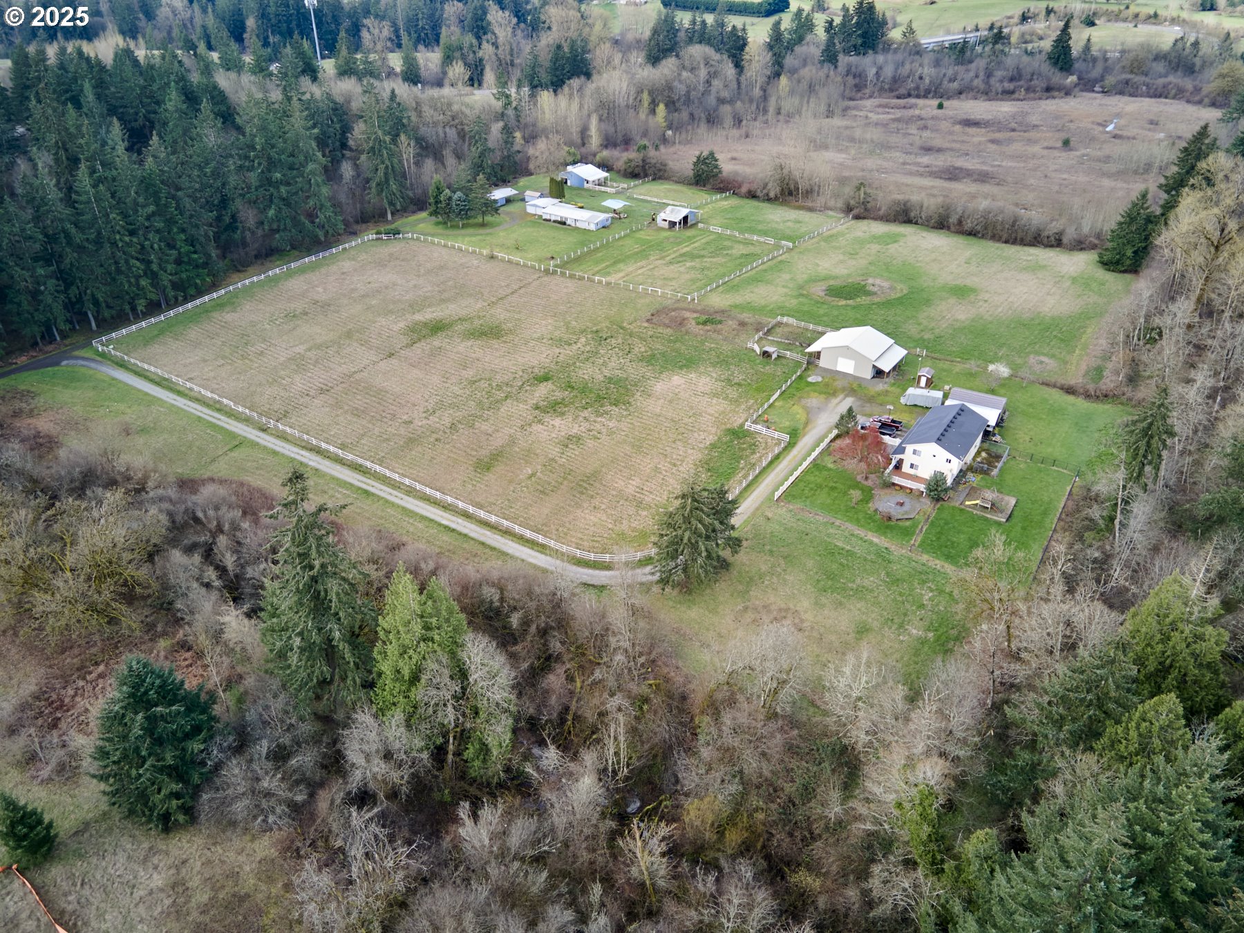 710 Northeast 221st Way Ridgefield, WA 98642 - Photo 8 of 23 a backyard of a house with lots of green space