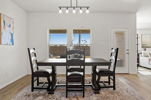 a view of a dining room with furniture