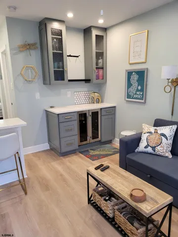 a living room with furniture and a table