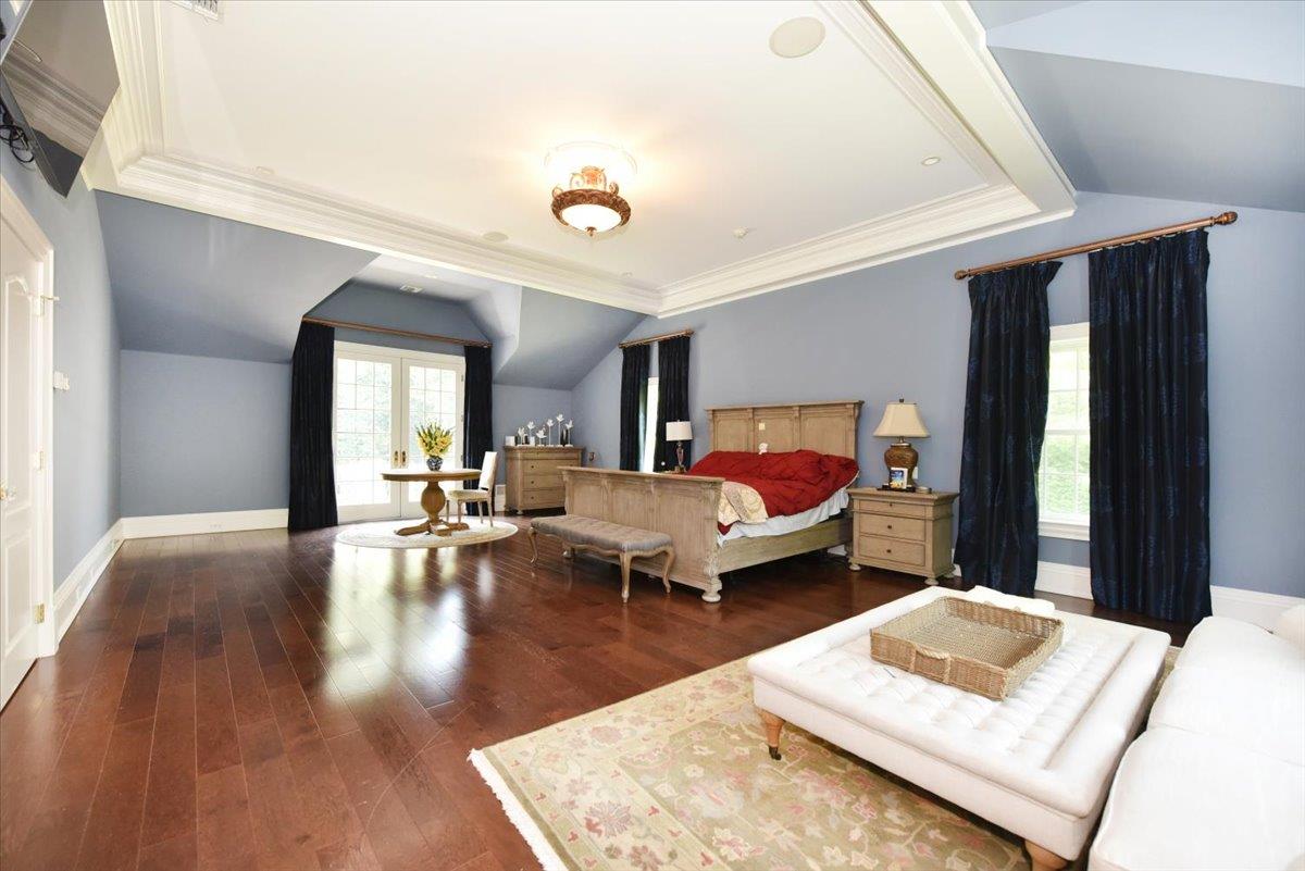 1616 Stewart Lane Syosset, NY 11791 - Photo 21 of 38 Bedroom with lofted ceiling, wood finished floors, and ornamental molding