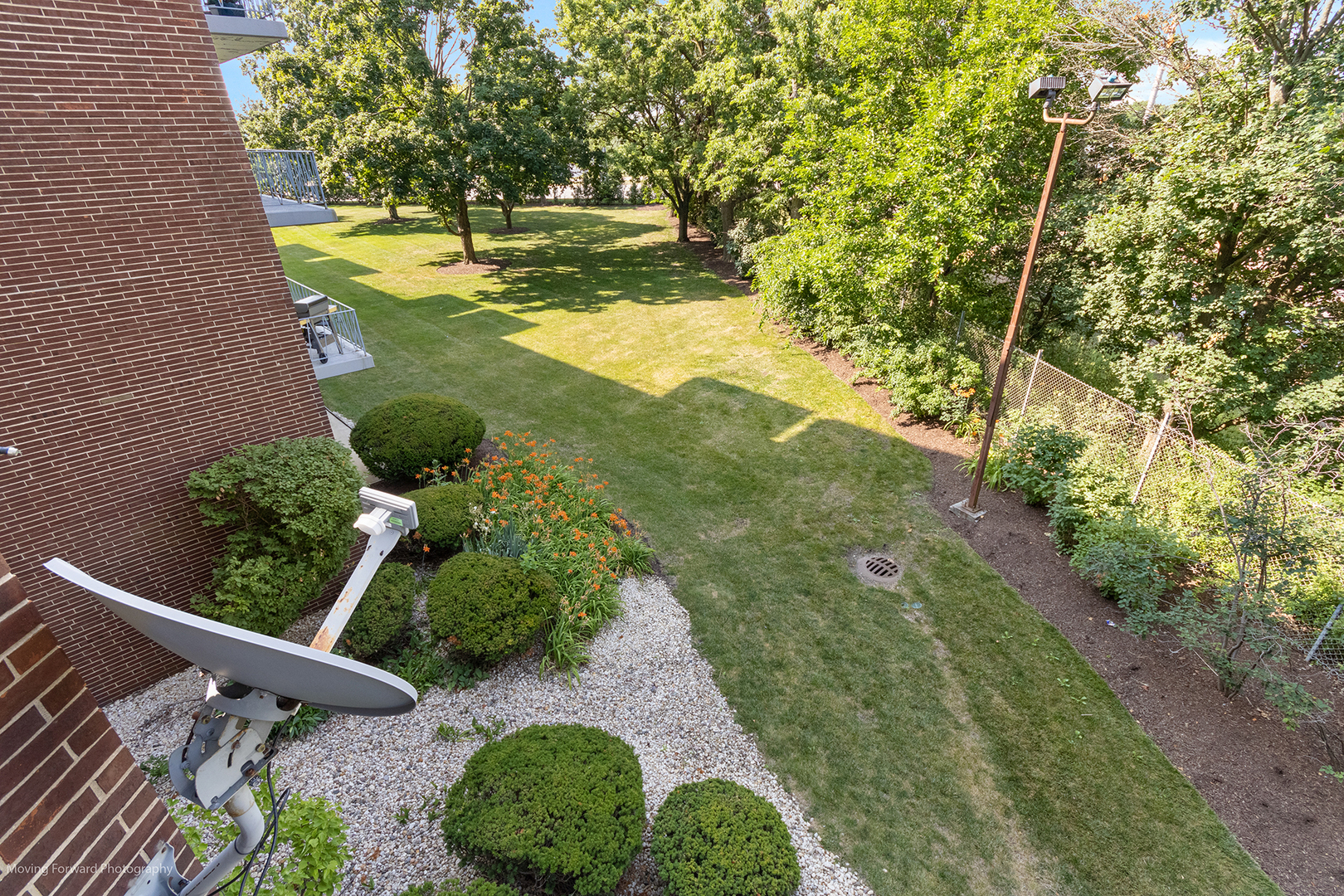 2900 Maple Avenue, Unit 13C Downers Grove, IL 60515 - Photo 24 of 36 a view of a back yard of the house