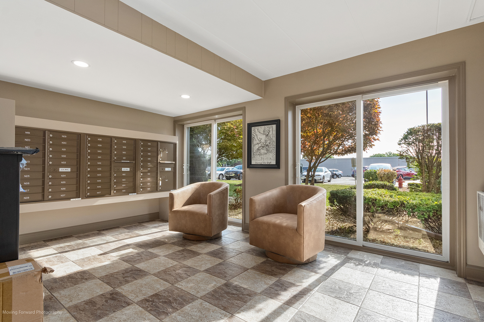 2900 Maple Avenue, Unit 13C Downers Grove, IL 60515 - Photo 29 of 36 a living room with furniture and large windows