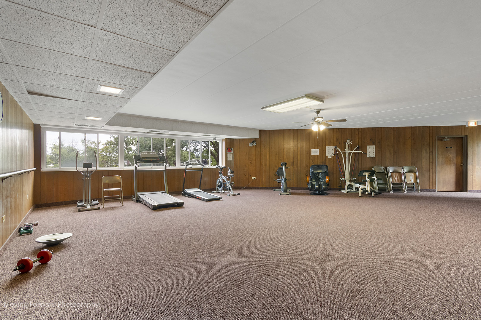 2900 Maple Avenue, Unit 13C Downers Grove, IL 60515 - Photo 31 of 36 a view of a room with gym equipment