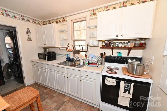 a view of living room washer and dryer