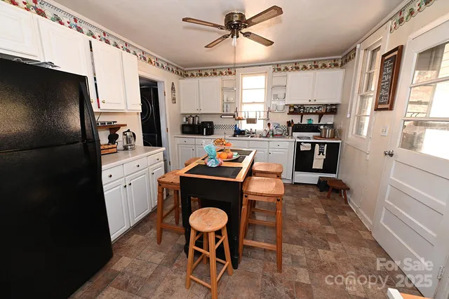 a bedroom with a bed and flat screen tv