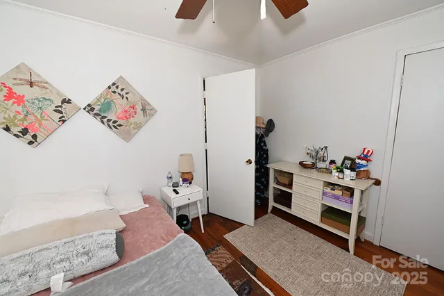 a shelf with books and knick knacks on it