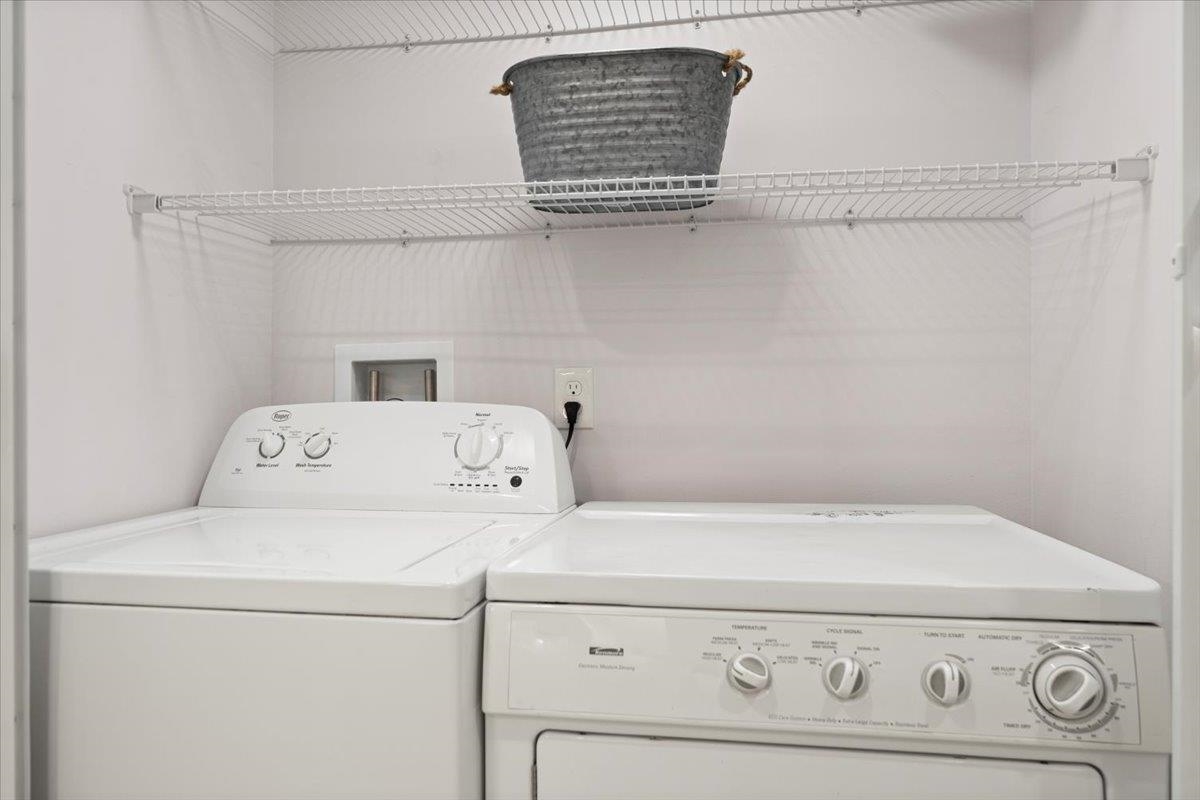 3960 A1A South St. Augustine, FL 32080 - Photo 13 of 44 a utility room with dryer and washer