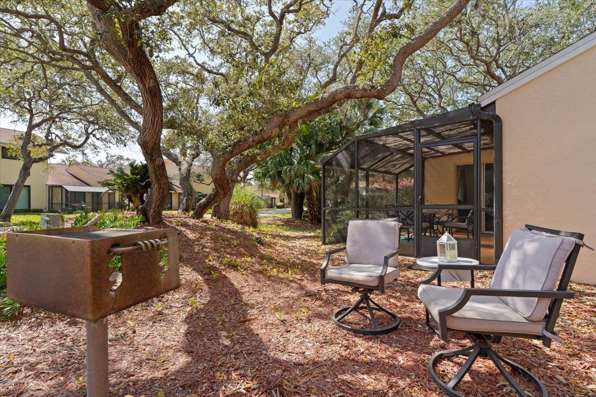 3960 A1A South St. Augustine, FL 32080 - Photo 24 of 44 a view of backyard of house with seating space