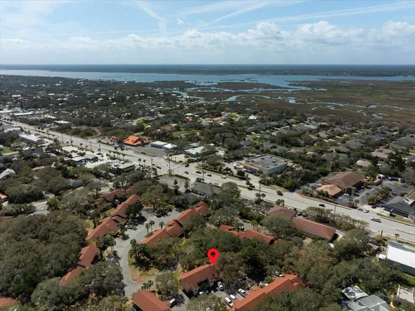 an aerial view of residential building and city view