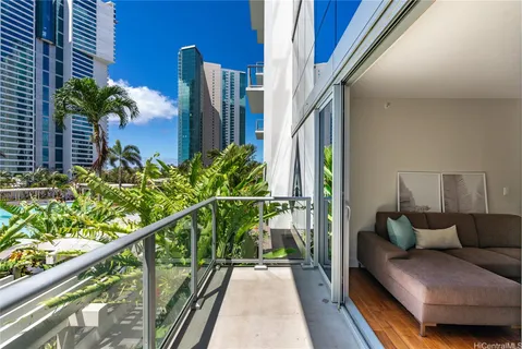 a view of balcony with furniture