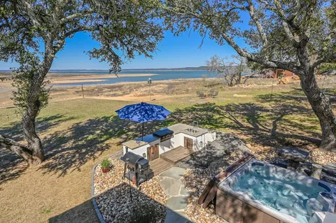 a view of a yard with an outdoor space