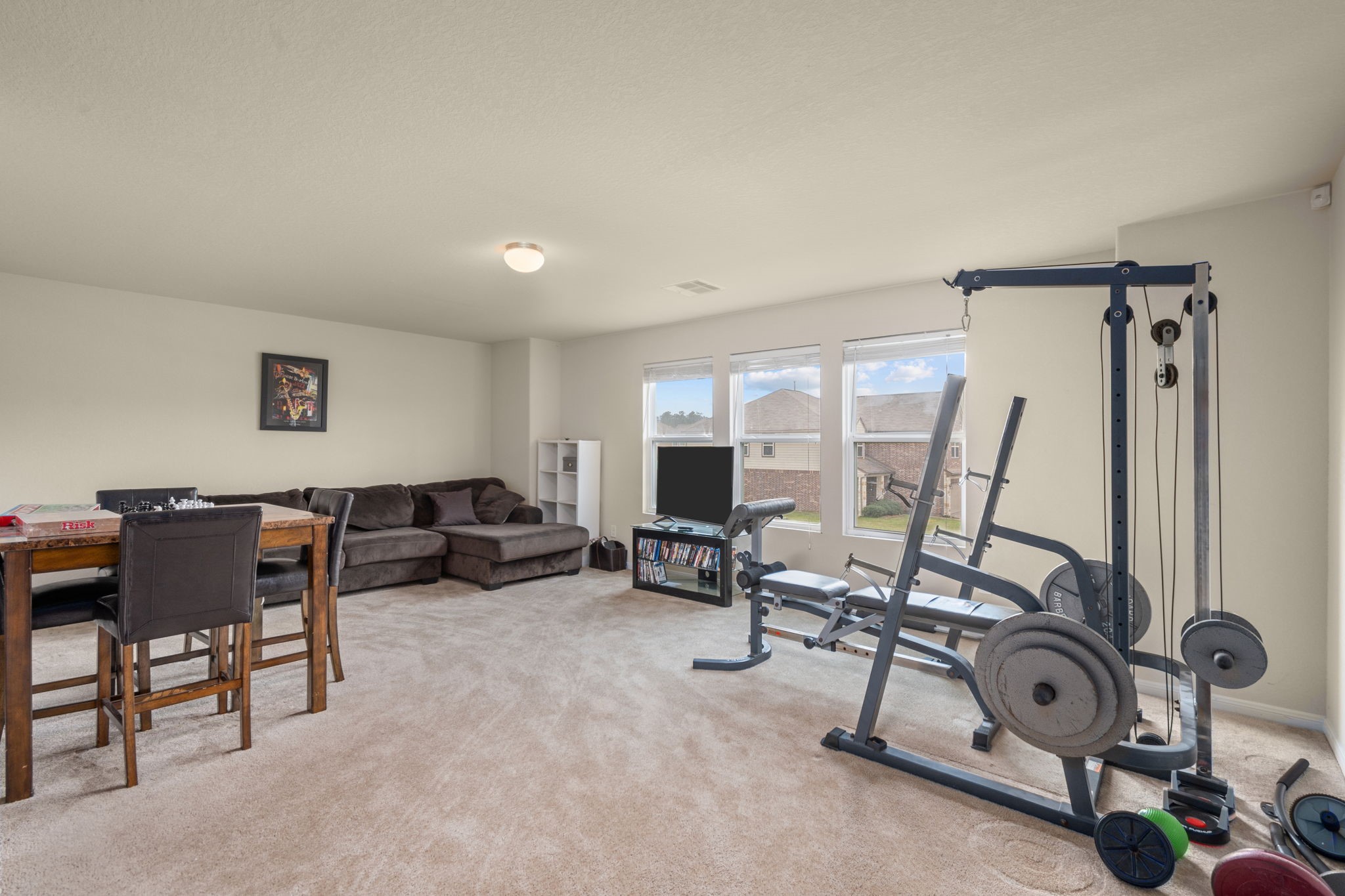 2702 Elm Crossing Trail Spring, TX 77386 - Photo 13 of 21 a view of a livingroom with furniture and a window