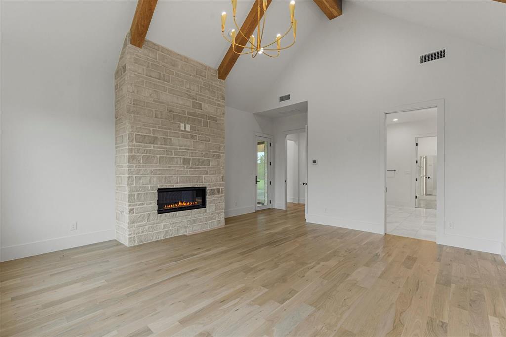 311 Longview Place Heath, TX 75032 - Photo 14 of 35 Fireplace & access to huge outdoor living area.