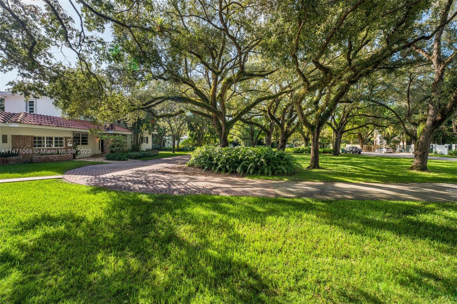7301 Ponce De Leon Road Miami, FL 33143 - Photo 6 of 12 a view of a park with large trees