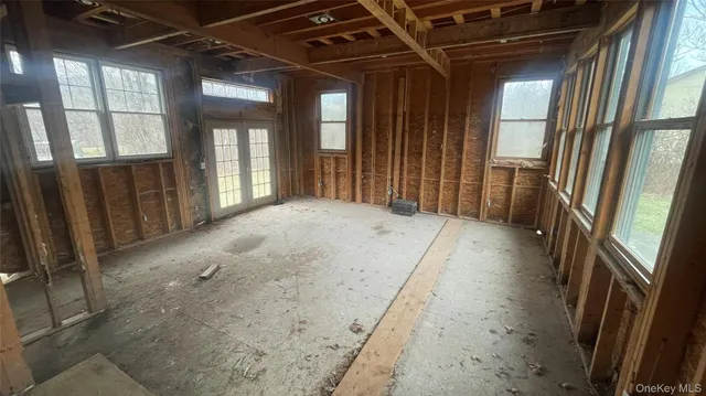 a view of hallway with windows