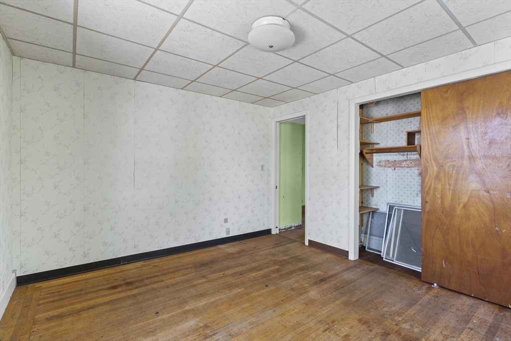 10 Alcott Street Boston, MA 02134 - Photo 15 of 36 a view of an empty room with a window