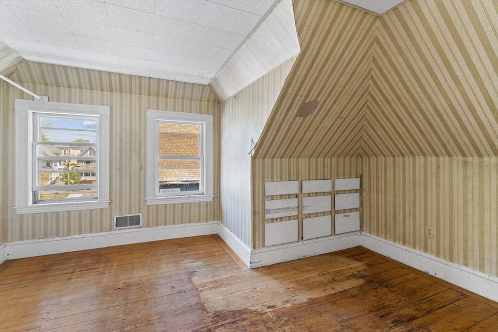10 Alcott Street Boston, MA 02134 - Photo 23 of 36 an empty room with windows
