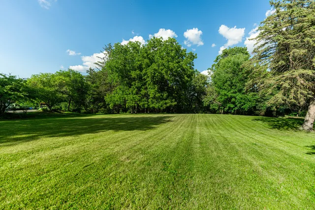 a view of a golf course with a lake