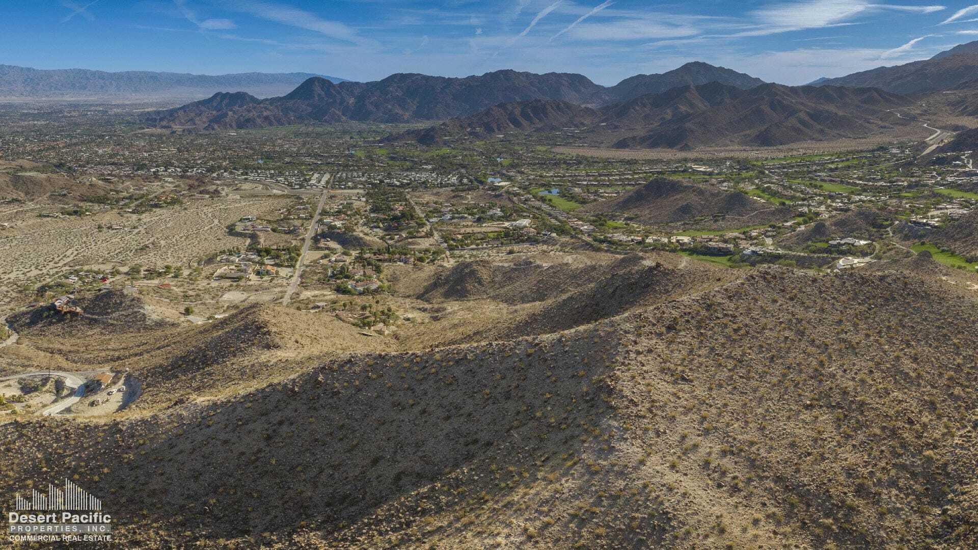 0 Cholla Way Palm Desert, CA 92260 - Photo 22 of 22 a view of a dry yard with mountains in the background
