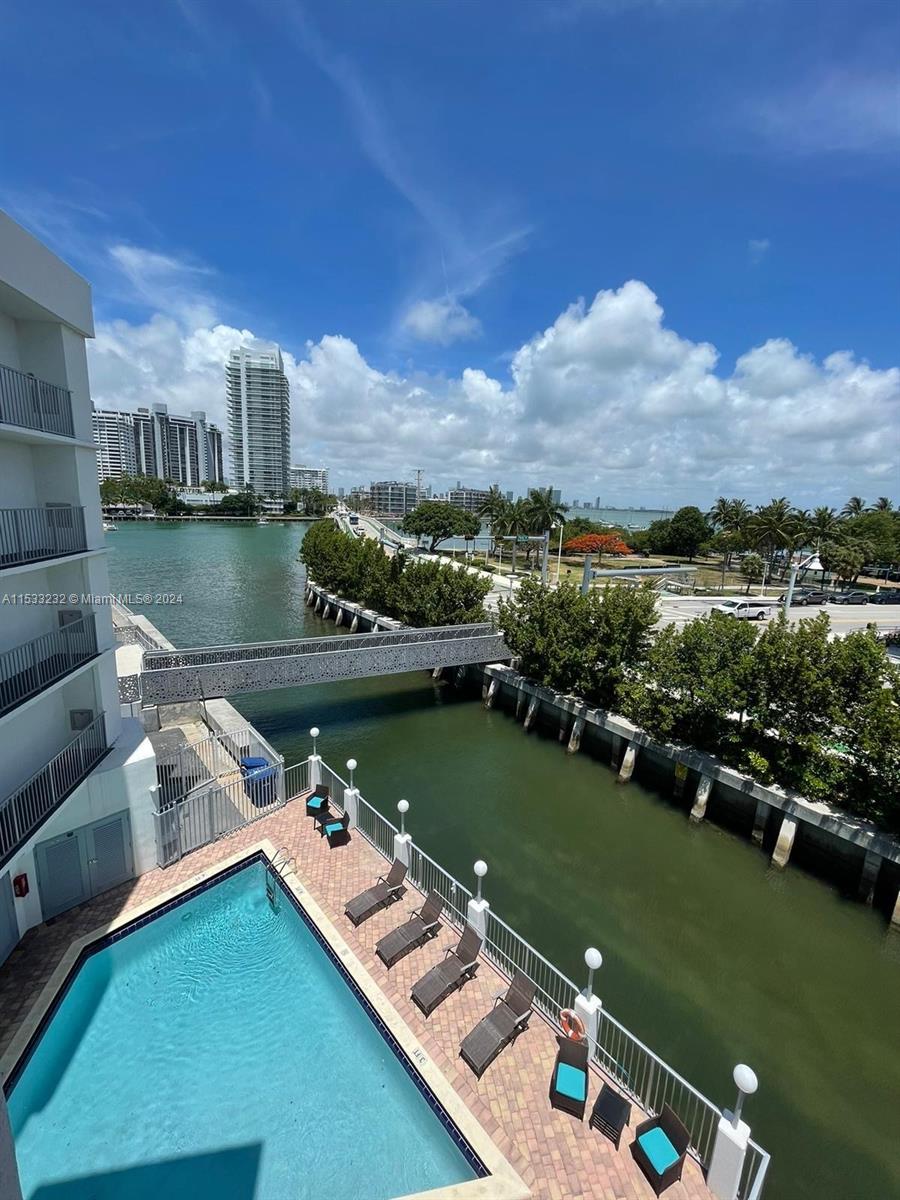 1674 Bay Road, Unit 402 Miami Beach, FL 33139 - Photo 15 of 16 a view of a lake with a city