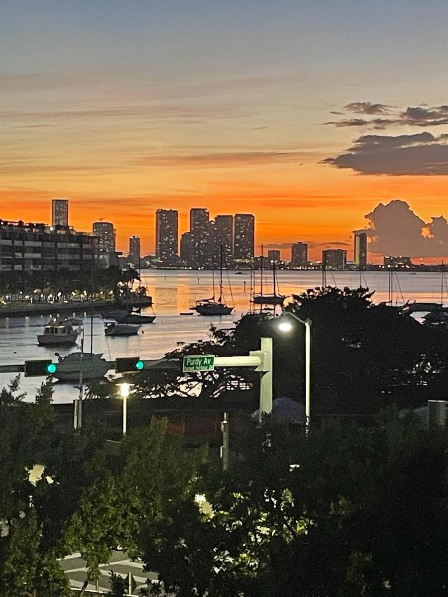 1674 Bay Road, Unit 402 Miami Beach, FL 33139 - Photo 2 of 16 a terrace with outdoor seating and city view