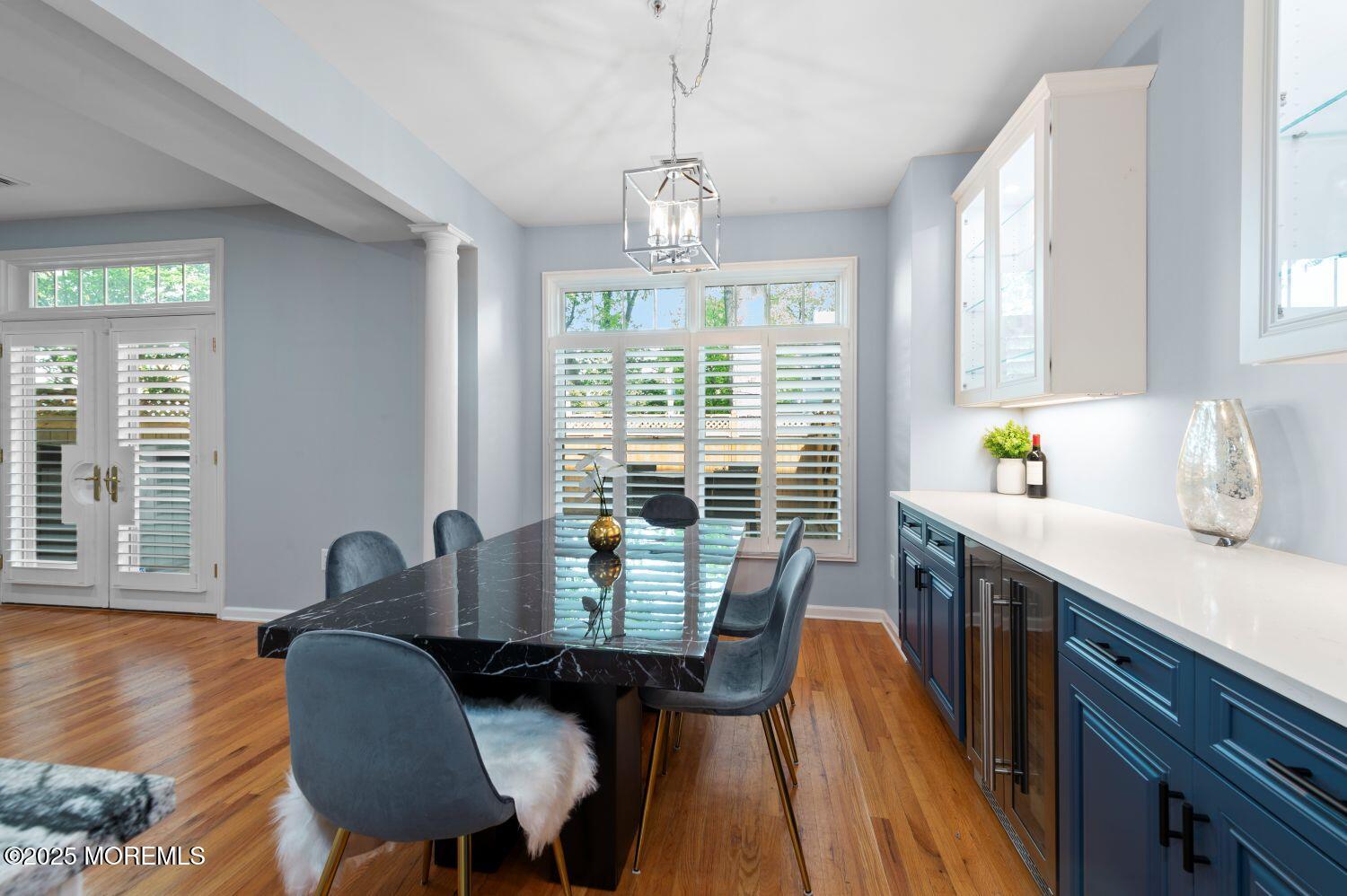 162 Main Street Manasquan, NJ 08736 - Photo 11 of 48 a view of a dining room with furniture window and wooden floor