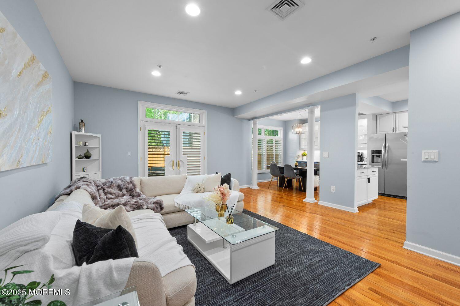 162 Main Street Manasquan, NJ 08736 - Photo 6 of 48 a living room with furniture and wooden floor