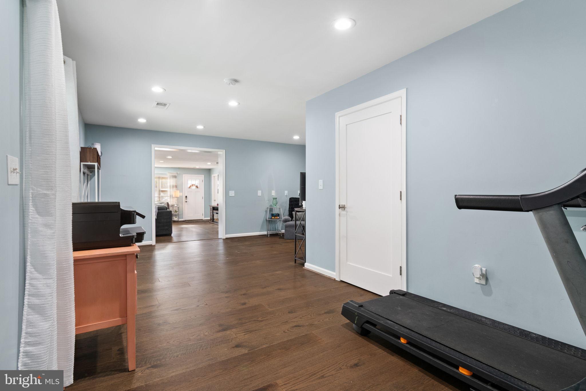 608 Blue Ridge Avenue Northeast Leesburg, VA 20176 - Photo 26 of 36 a view of a living room and dining room