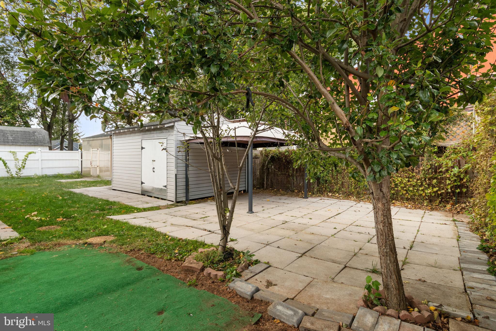 608 Blue Ridge Avenue Northeast Leesburg, VA 20176 - Photo 33 of 36 a view of a yard with plants and trees