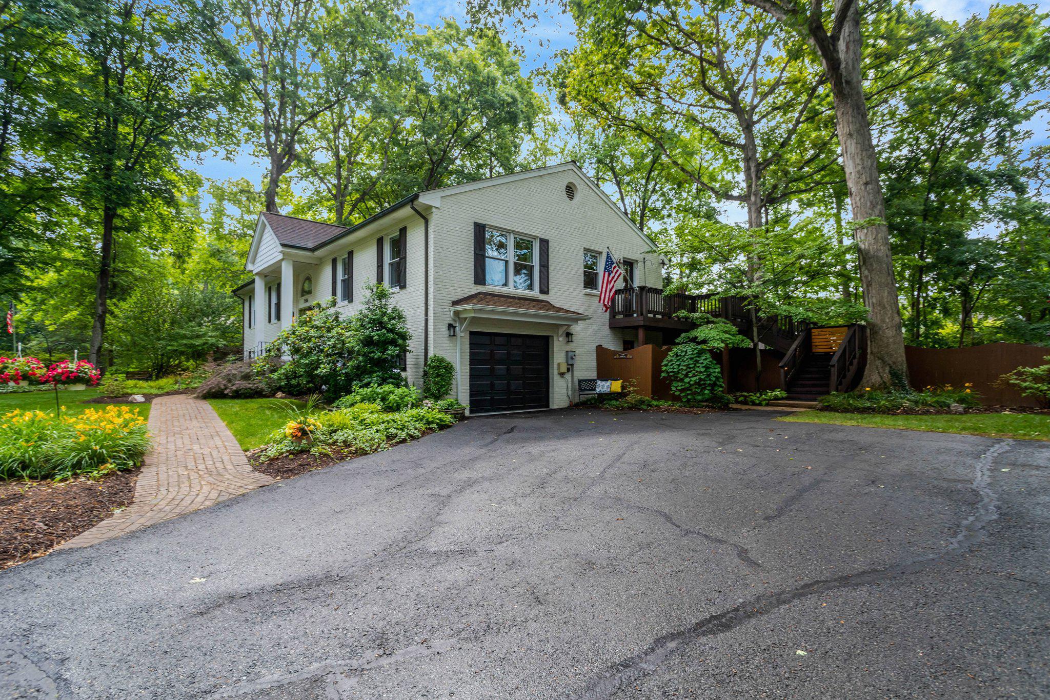 7506 Oriole Avenue Springfield, VA 22150 - Photo 59 of 67 a view of house with outdoor space and garden